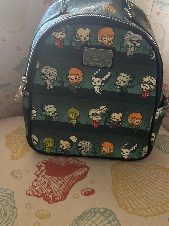 Loungefly Handbags - Loungefly Teal & Black Monsters Mini Backpack